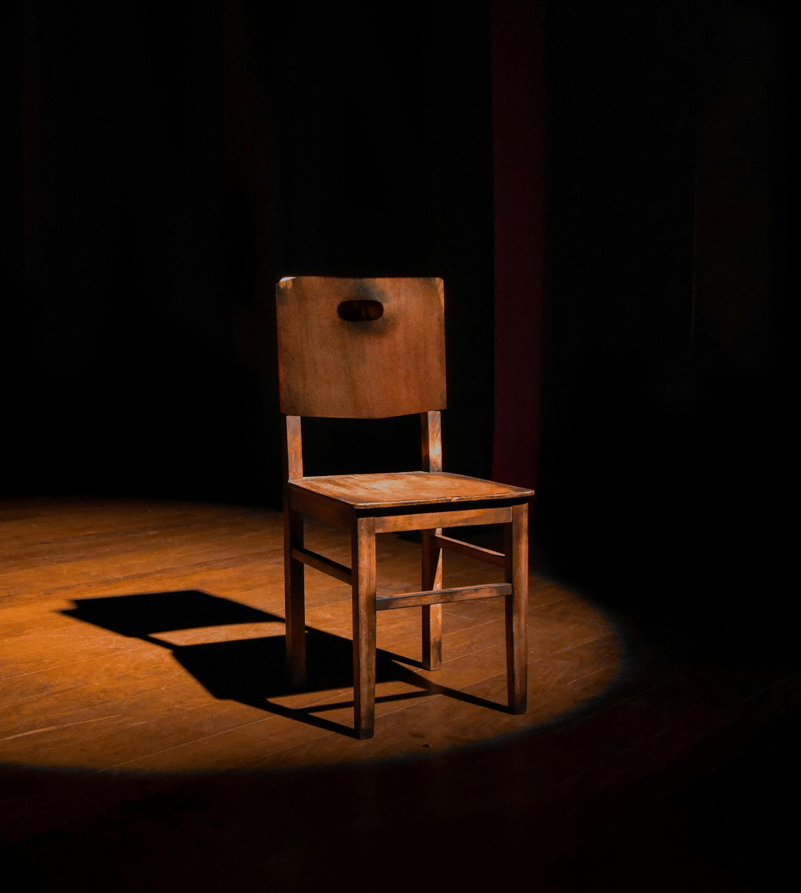 Theater chair in spotlight
